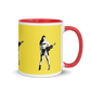 Yellow mug with various colors inside